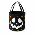 Runde Aufbewahrungstasche 30 x 35 cm aus Polyester schwarz mit Kürbisgesicht und Tragegriffen